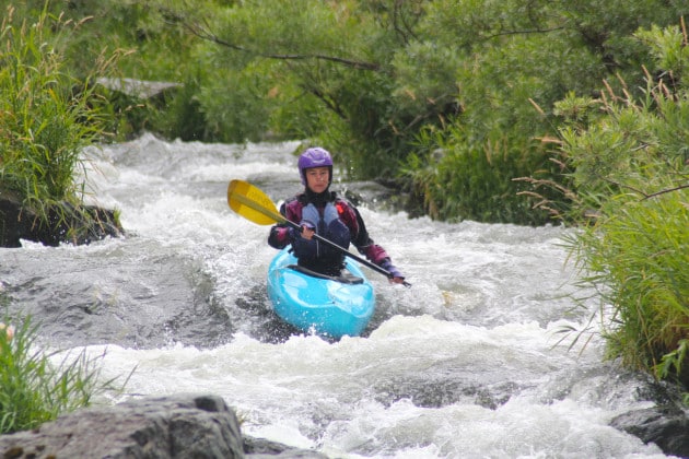 Zoe kayaking the fish ladder on the rogue river